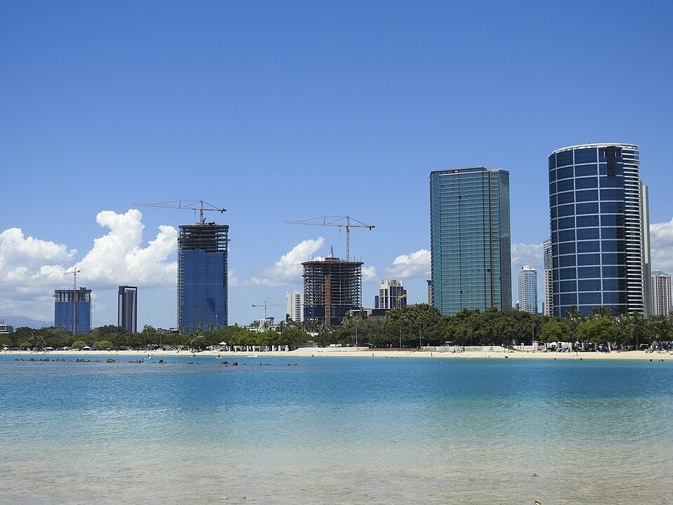 The calm water of Ala Moana Beach, with the towers of Kakaʻako behind