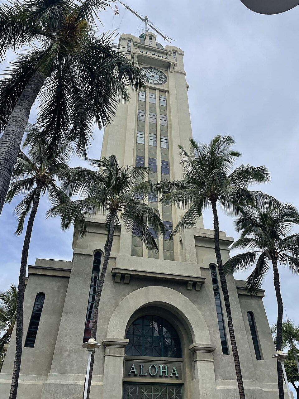 Aloha Tower's clock stage and the word ALOHA over its door