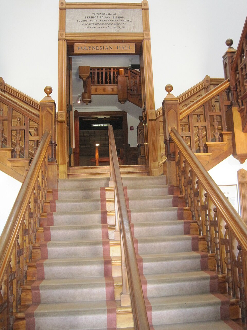 The koa-wood staircase inside Hawaiian Hall
