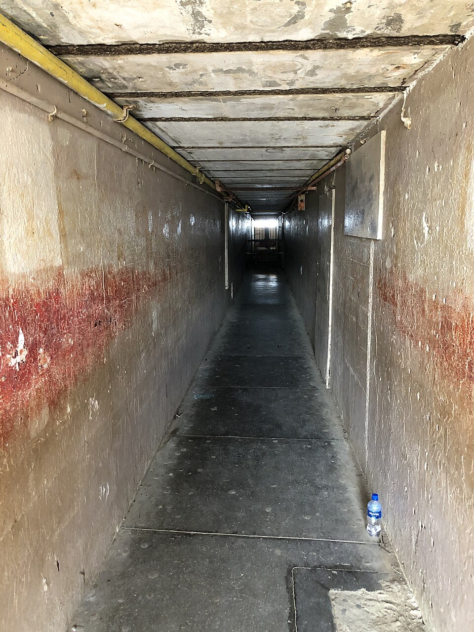Inside the Diamond Head trail tunnel, lit and railed
