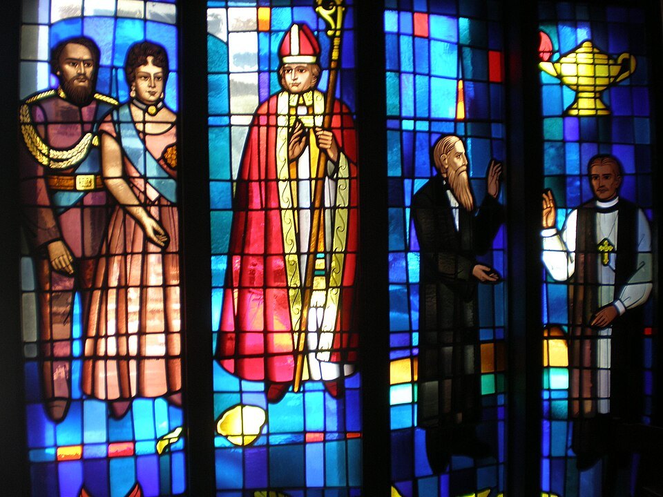 A stained-glass window at St. Andrew's with figures in royal dress