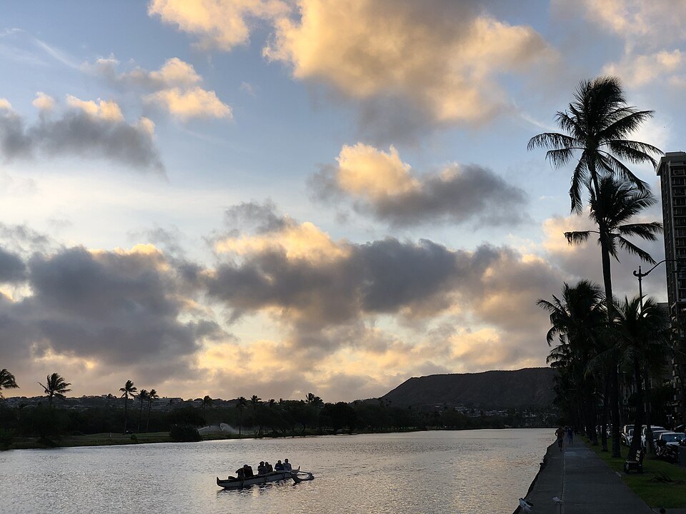 Dawn on the Ala Wai Canal, a canoe crew on the water
