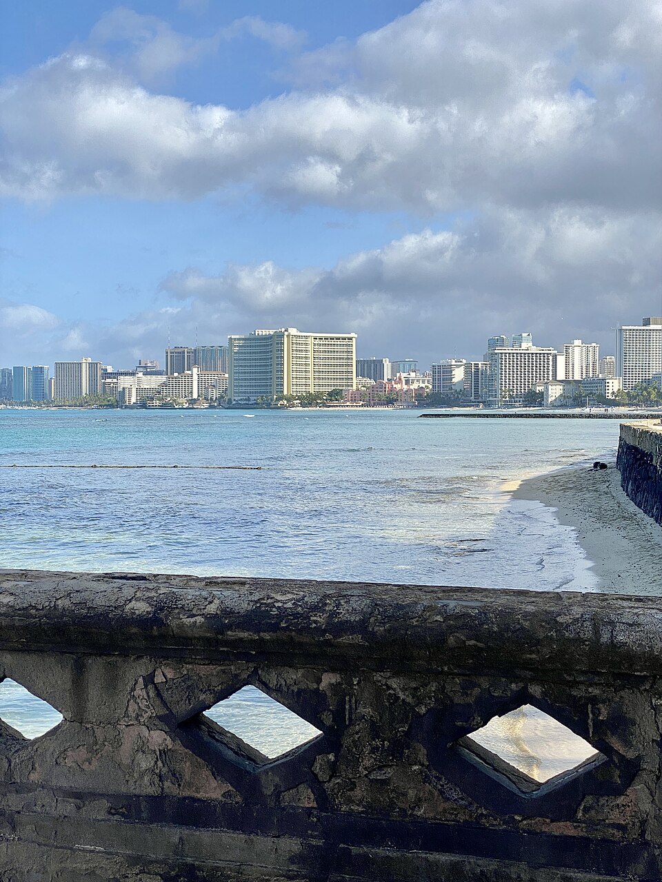 Waikīkī's hotels seen across the water from the Natatorium's wall