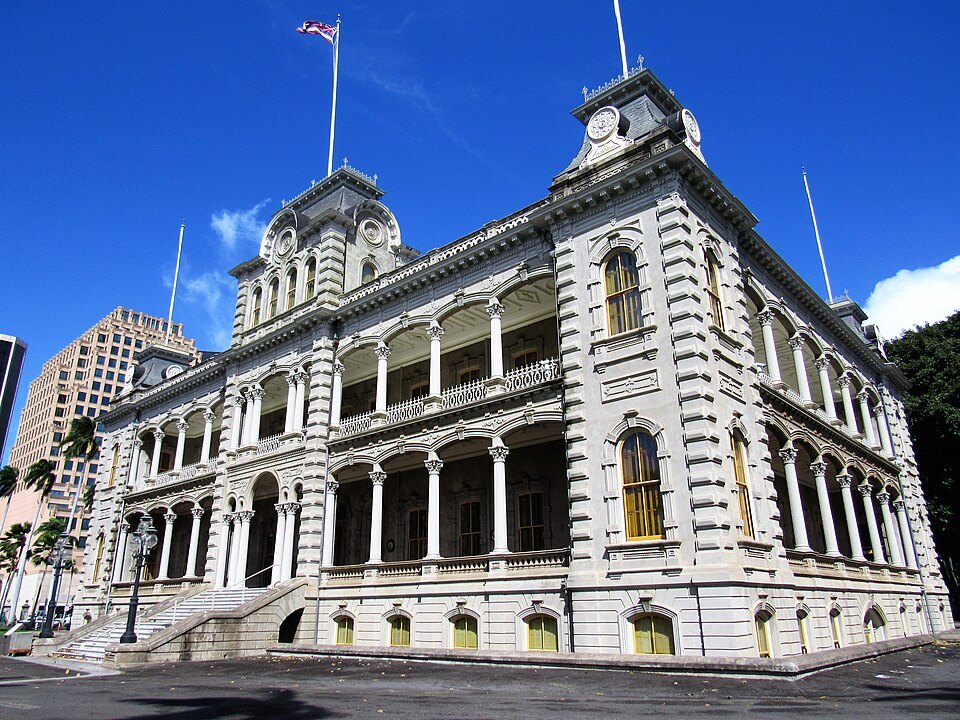 ʻIolani Palace from the corner, its towers and two-story lanai