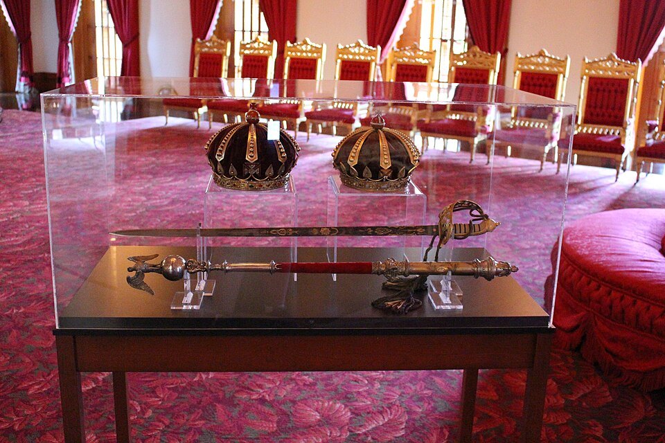 Crowns and regalia on display in the throne room