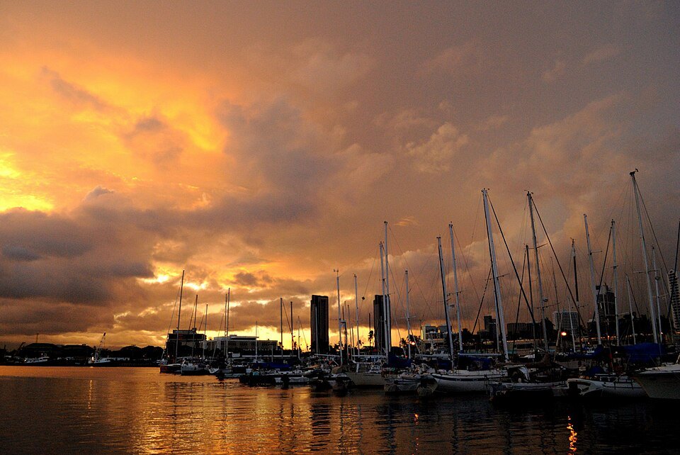 Kewalo Basin at dusk under a burning sky