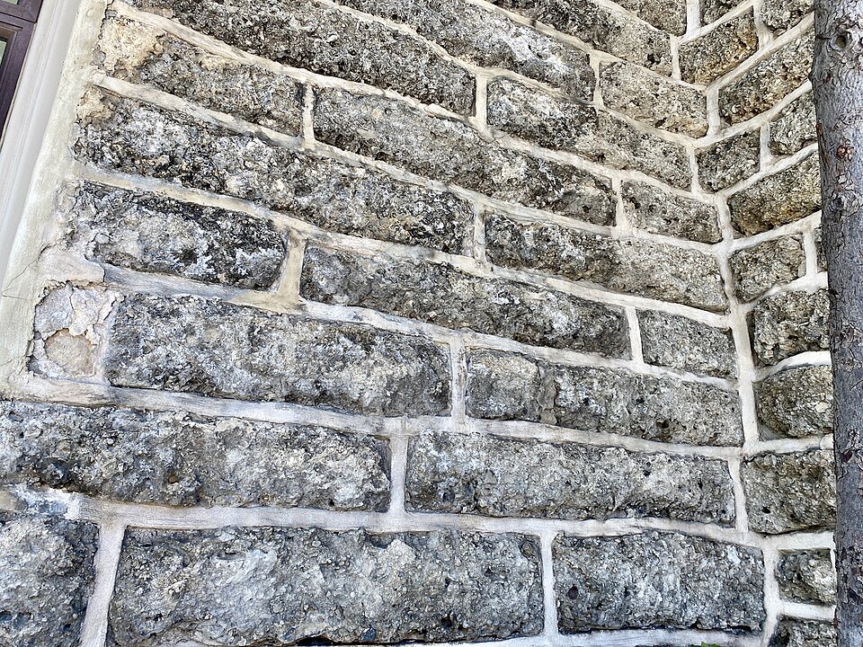 Coral blocks in the church wall, cut from the reef in the 1830s