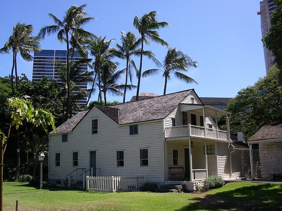 A white frame house of the Hawaiian Mission Houses, across the street