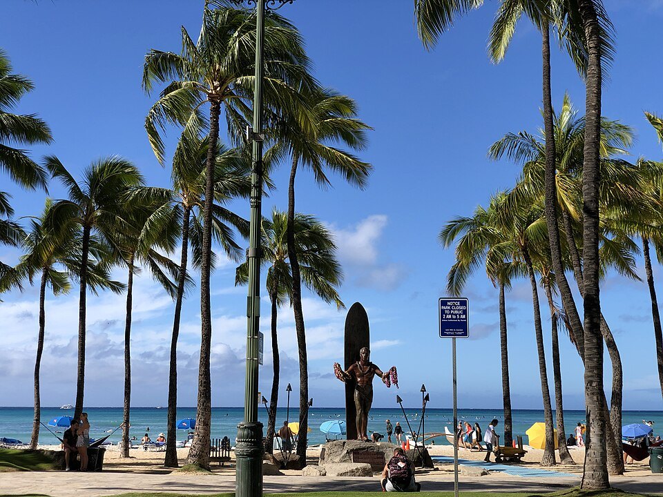 The Duke Kahanamoku statue on Kūhiō Beach, with his surfboard